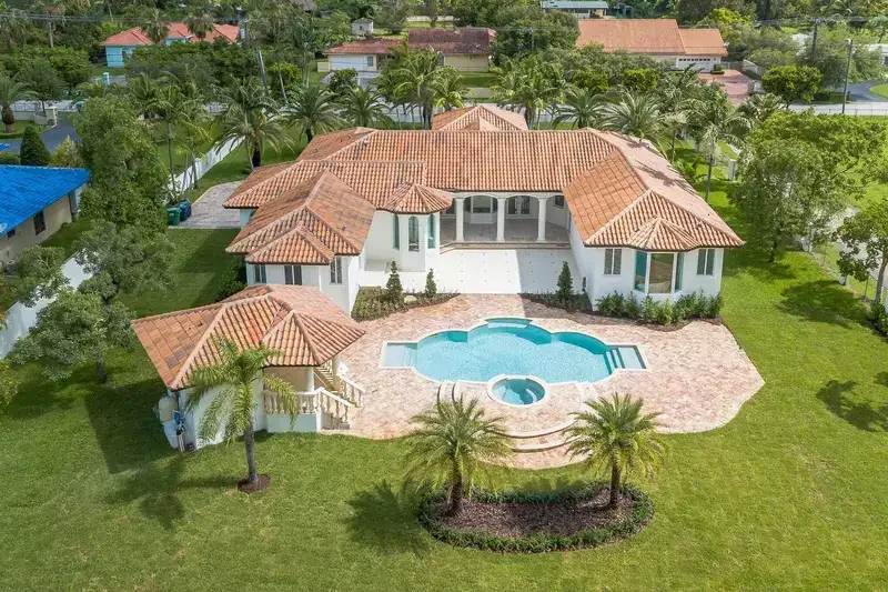 Aerial view showing a property and its surrounding area