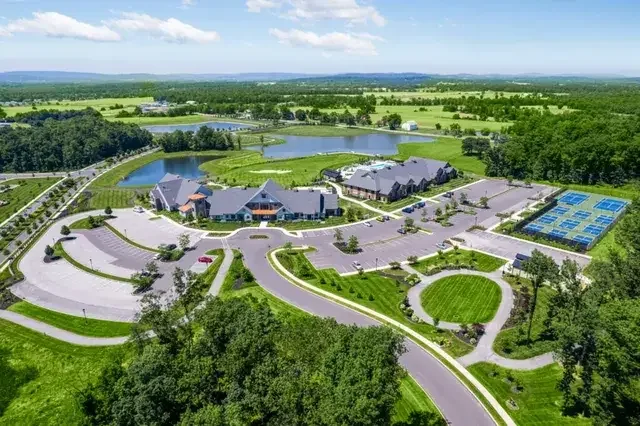 Aerial view showing a property and its surrounding area