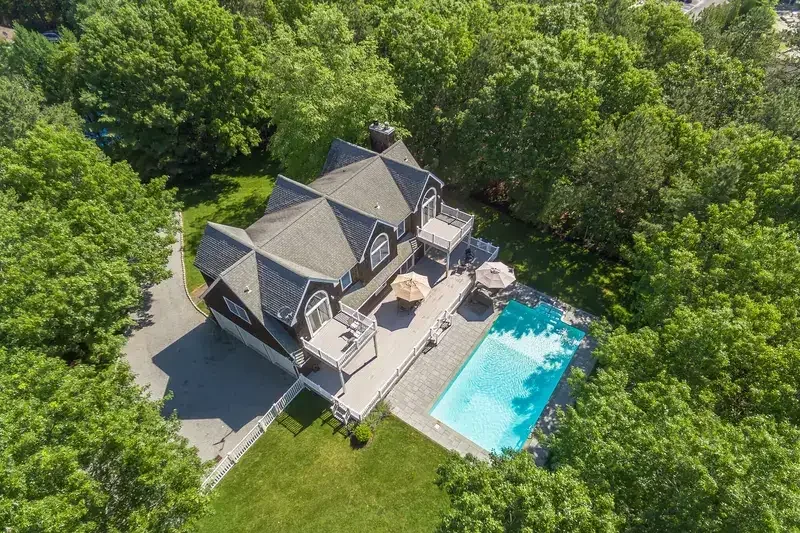 Aerial view showing a property and its surrounding area