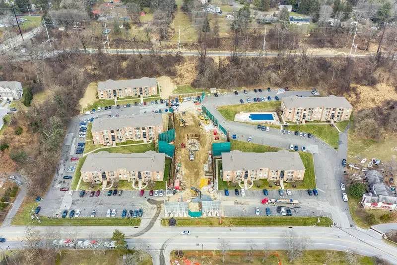 Aerial view showing a property and its surrounding area