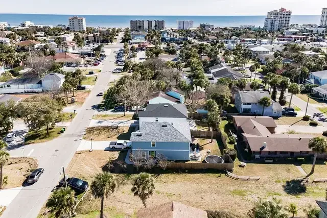 Aerial view showing a property and its surrounding area