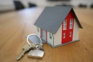 Home inspector evaluating home inspection cost during a property walkthrough